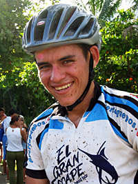 Maikol, an Amigo Tico sponsored Mountain Biker from Quepos after a mud-splattering race.